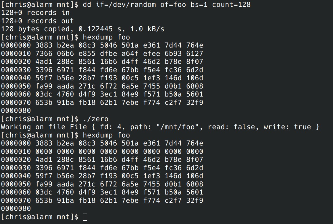 Screenshot of a console session. Commands executed are, in order: dd that creates a 128 byte file with random contents. Hexdump shows the contents. A program called zero is run and hexdump shows bytes 16 to 31 zeroed.